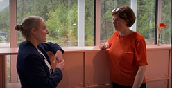 Henrietta Carbonel and Monica Ward conversing